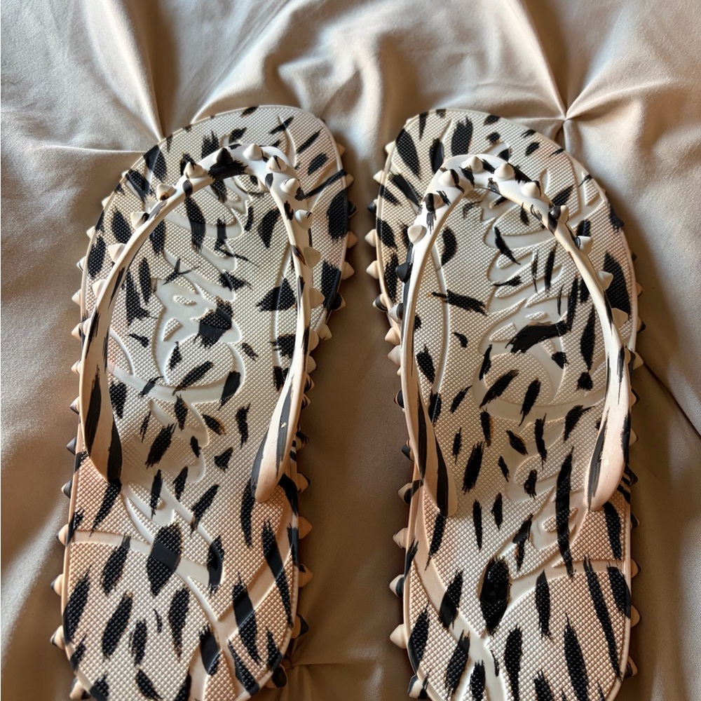 Christian Louboutin Beige and Black Patterned Studded Flip Flop Sandals